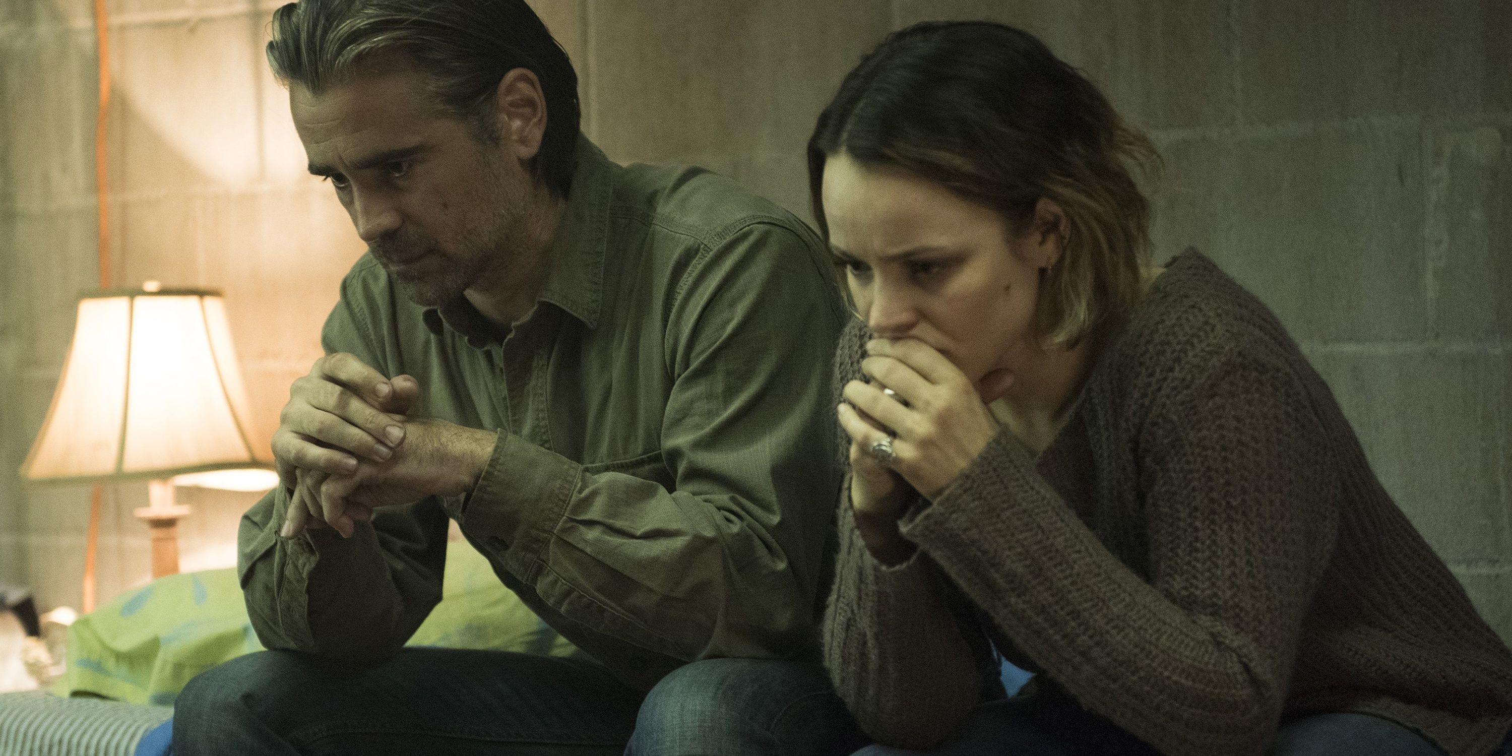 Colin Farrel as Ray and Rachel McAdams as Ani in True Detective season 2 sitting on a couch upset