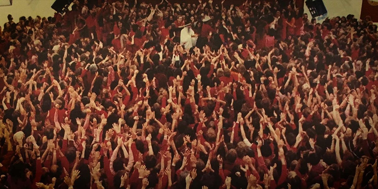 An image of people praying from Wild Wild Country documentary