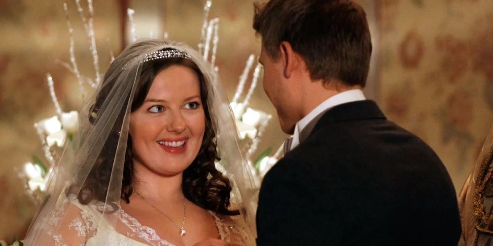 Dorota smiling while marrying Vanya