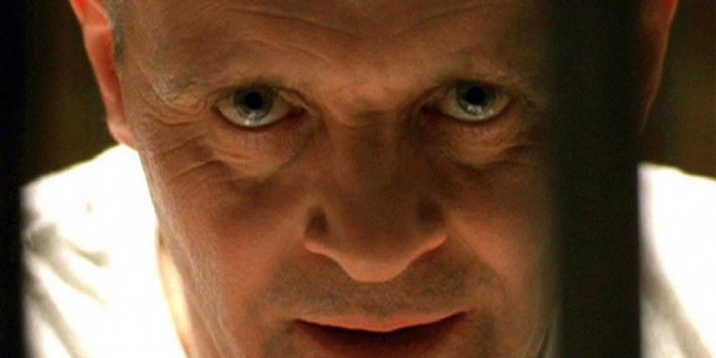 Anthony Hopkins as Hannibal Lecter staring through jail bars in Silence of the Lambs