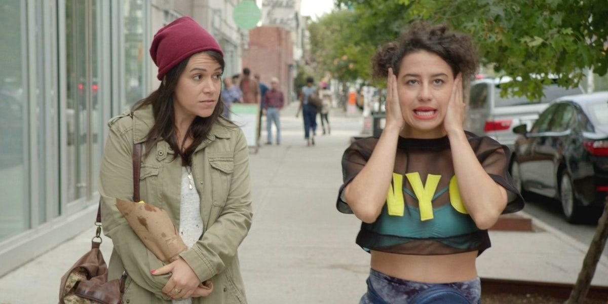 Abbi and Ilana walking together in Broad City. 