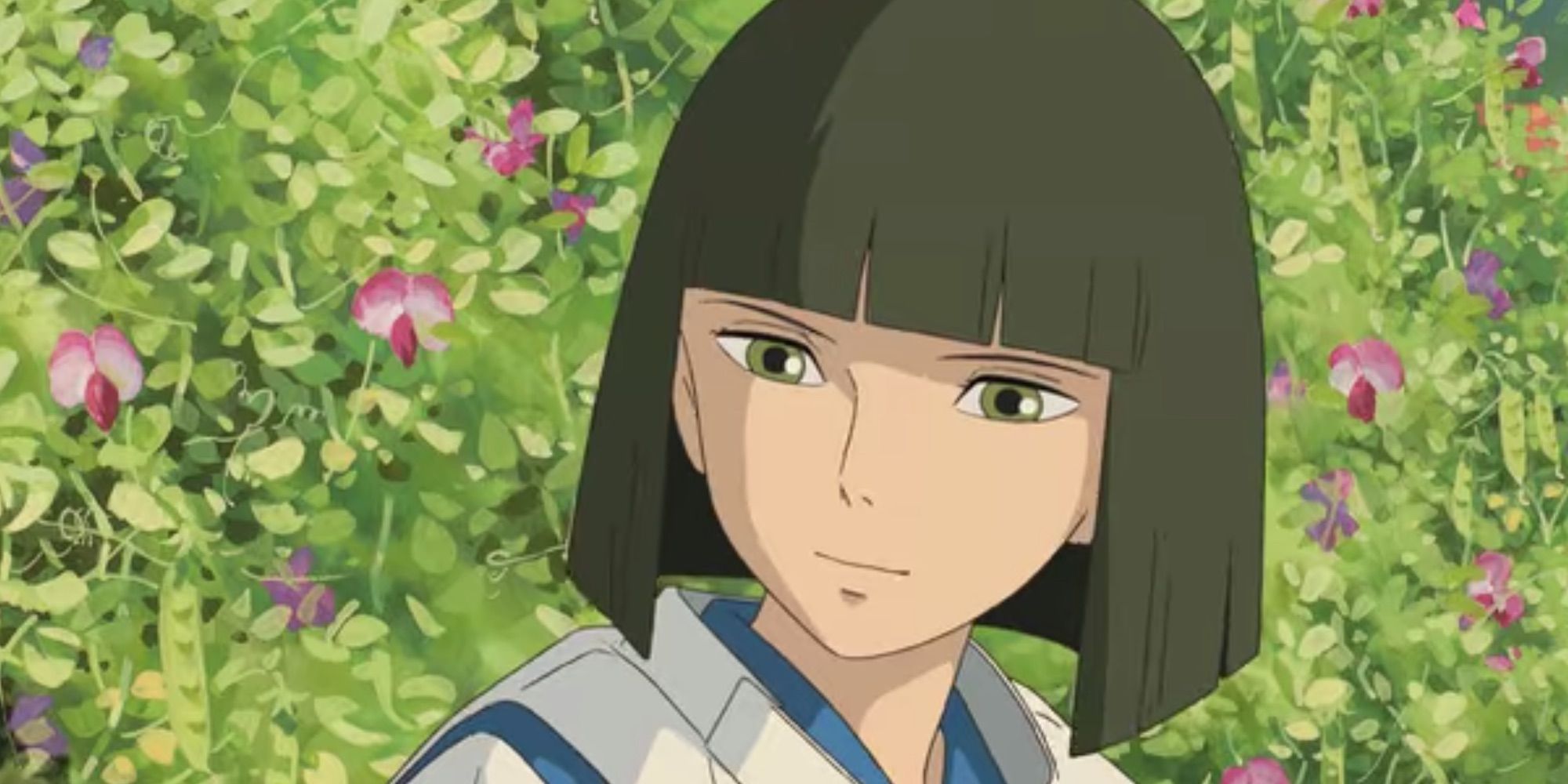 Haku olhando gentilmente para Chihiro em Spirited Away