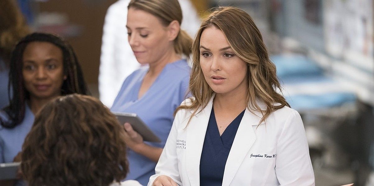 Jo looks at Bailey with concern in white coat