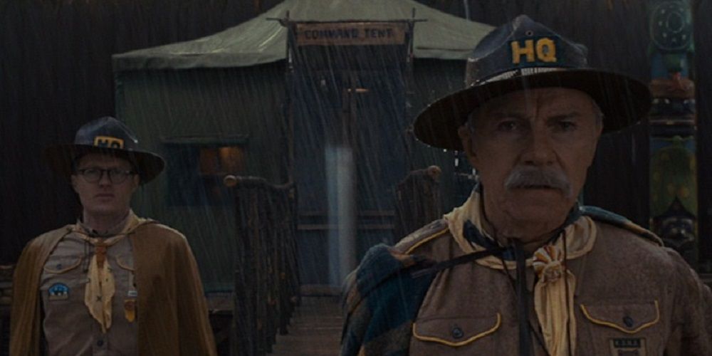 Harvey Keitel standing in the rain in Moonrise Kingdom
