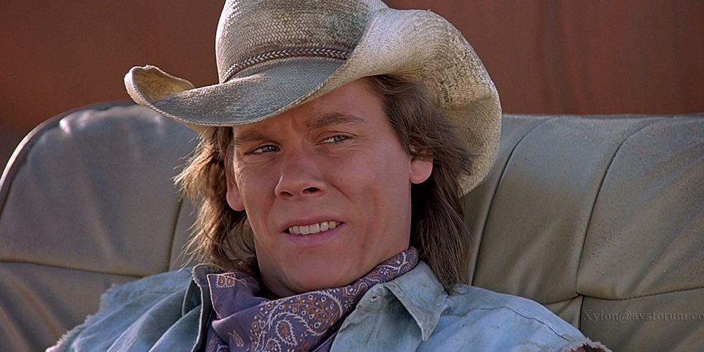 Kevin Bacon's character relaxes in Tremors