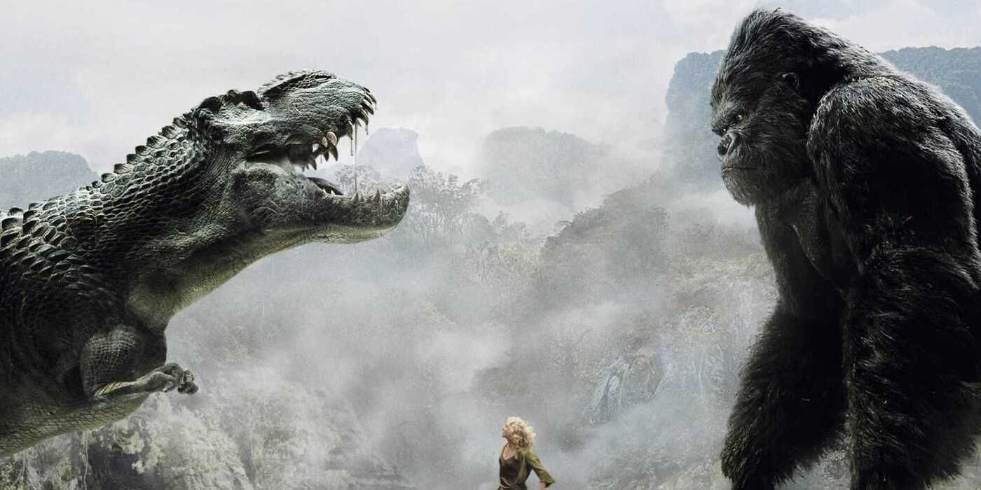 A dinosaur and King King face off with a woman between them in 2005's King Kong