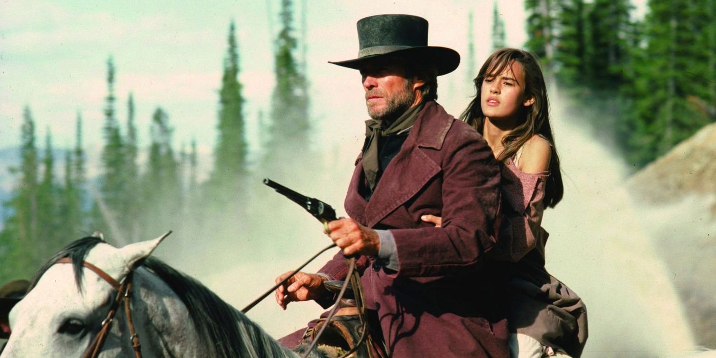 A man and a woman on a horse in Pale Rider