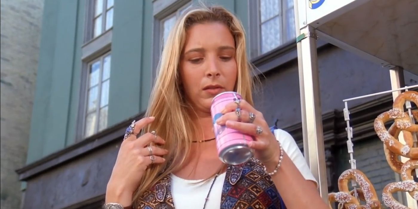 Phoebe looks into a can of soda in Friends