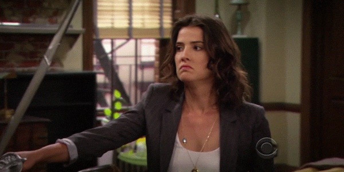 Robin in the apartment looking angry on How I Met Your Mother