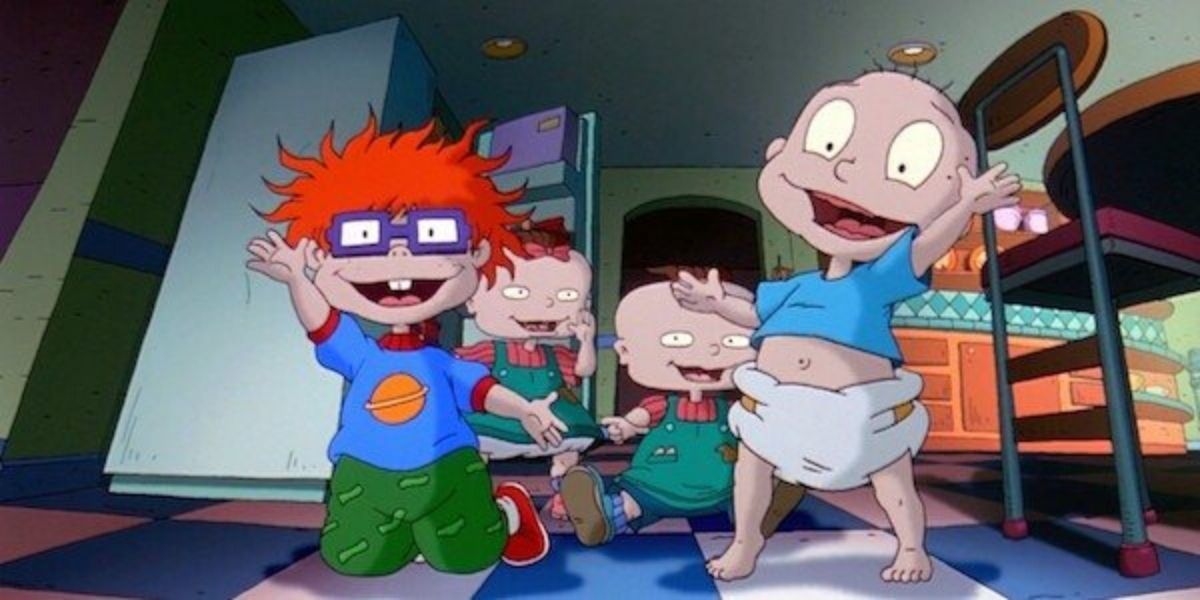 Chuckie, Tommy, Phil, and Lil from Rugrats waving to the camera on Rugrats