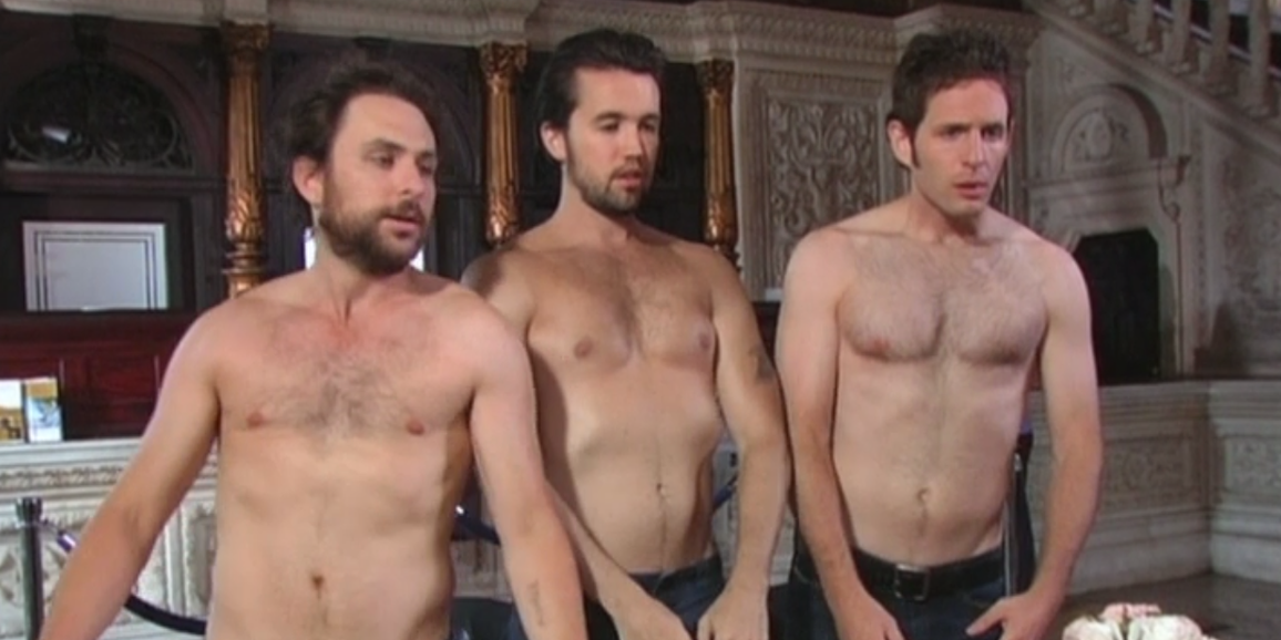Charlie, Mac, and Dennis standing in a bank half-naked in It's Always Sunny in Philadelphia.