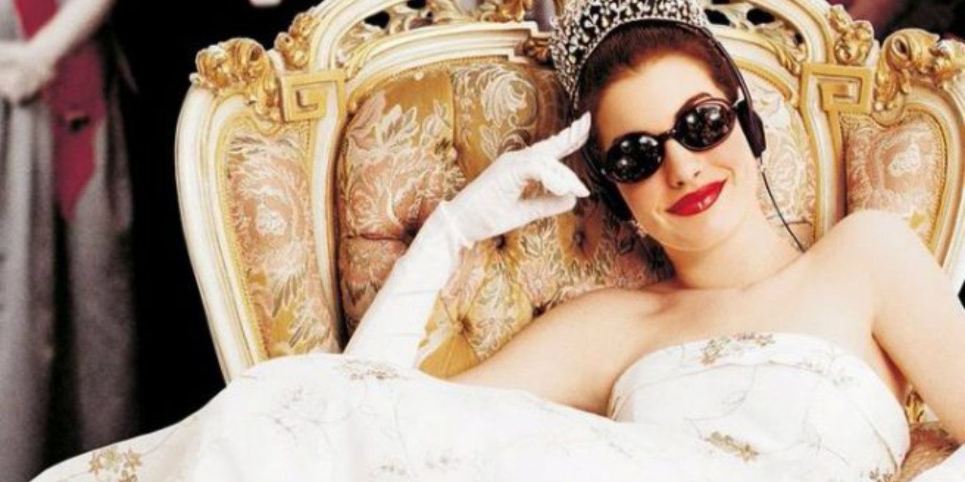 Anne Hathaway in sunglasses as Mia on the throne