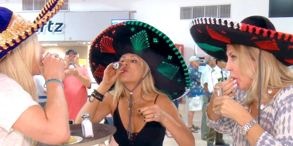 Vicki, Tamra, and Shannon drinking at the airport on RHOC