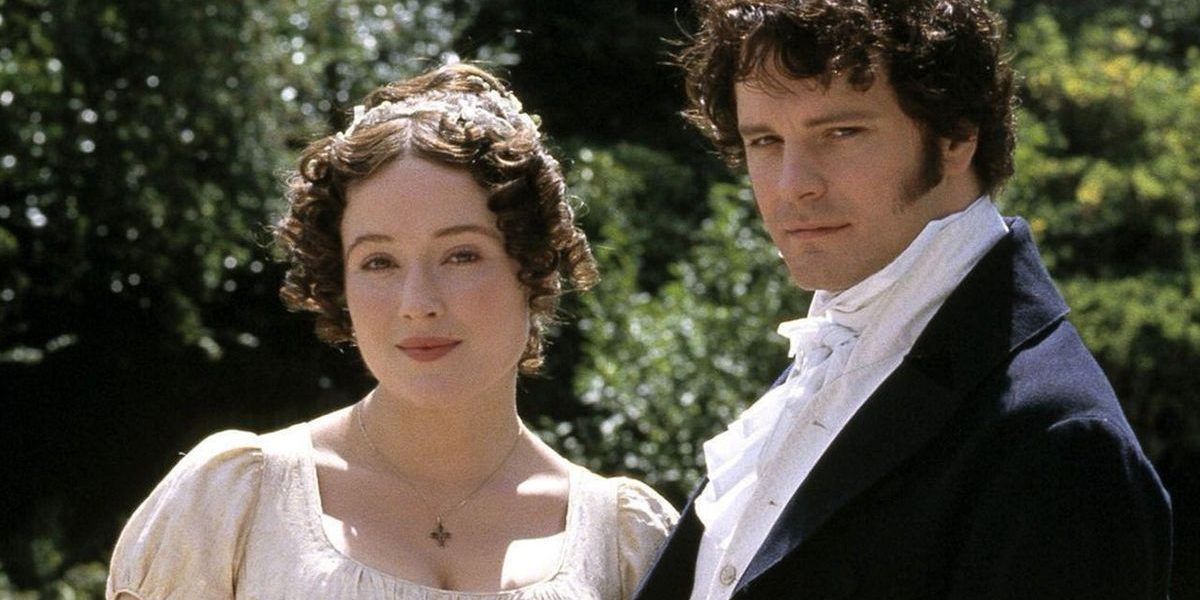 Elizabeth and Darcy smile for the audience in a 1995 Pride and Prejudice promotional image