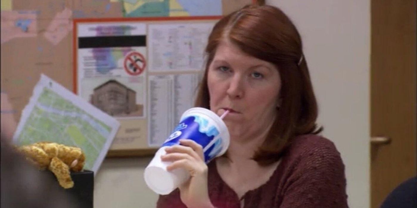 Meredith takes a sip of her drink in The Office.