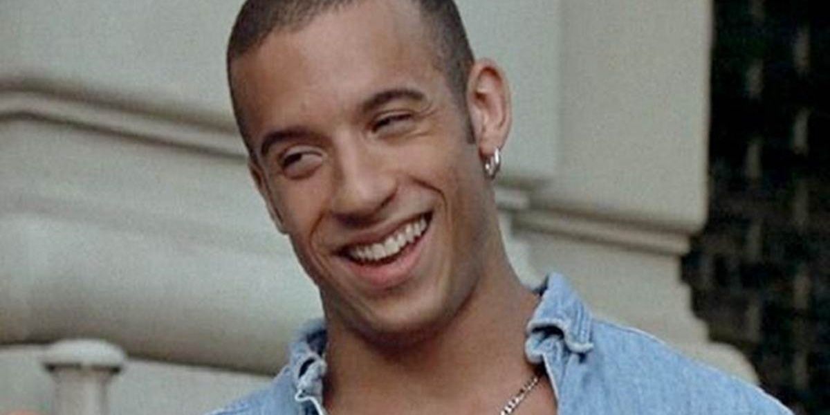 Vin Diesel laughing in a still from Multi Facial