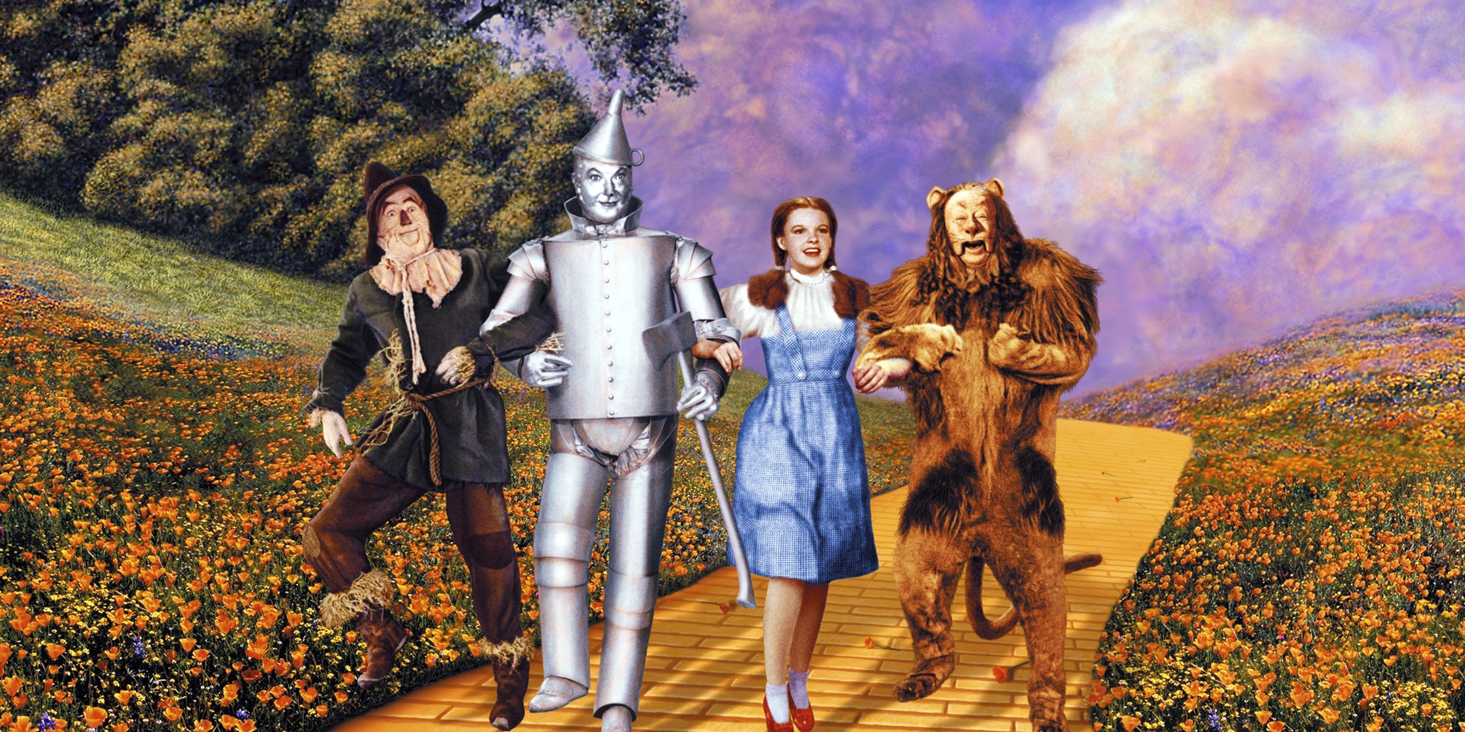 Dorothy with the Scarecrow, Tin Man, and the Cowardly Lion in The Wizard of Oz (1939)