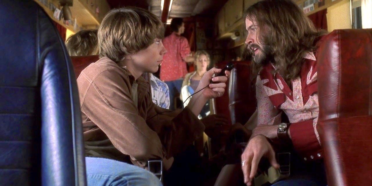 William interviews Russell on a bus in Almost Famous.