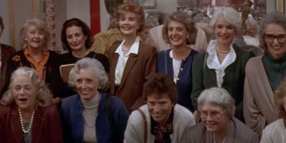 A group of women smiling at the end of A League of Their Own