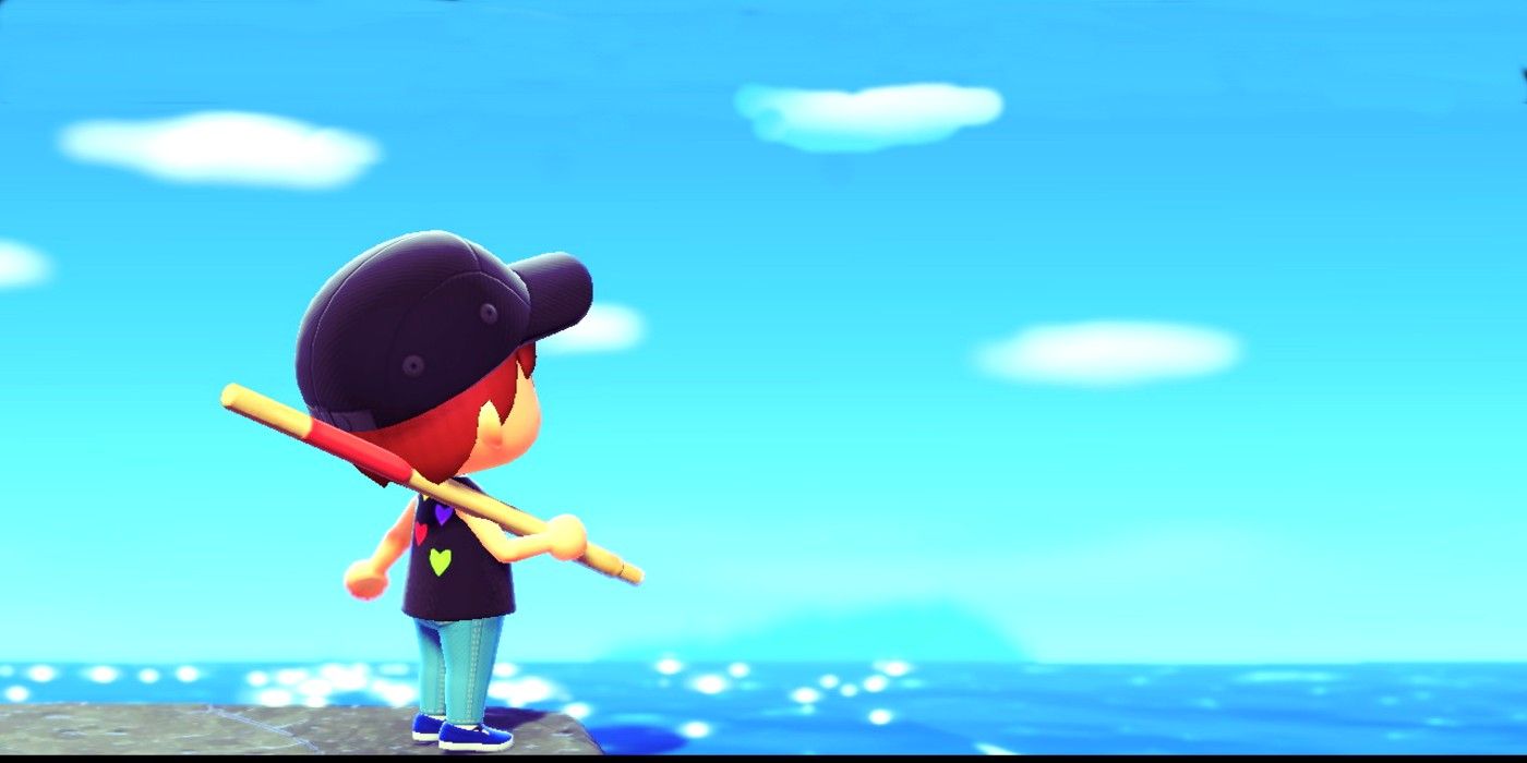 A player with a fishing rod looks over the ocean in Animal Crossing: New Horizons