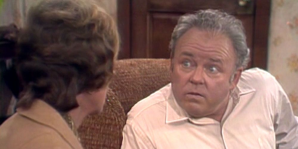 Archie Bunker in his chair staring at Edith in All in the Family