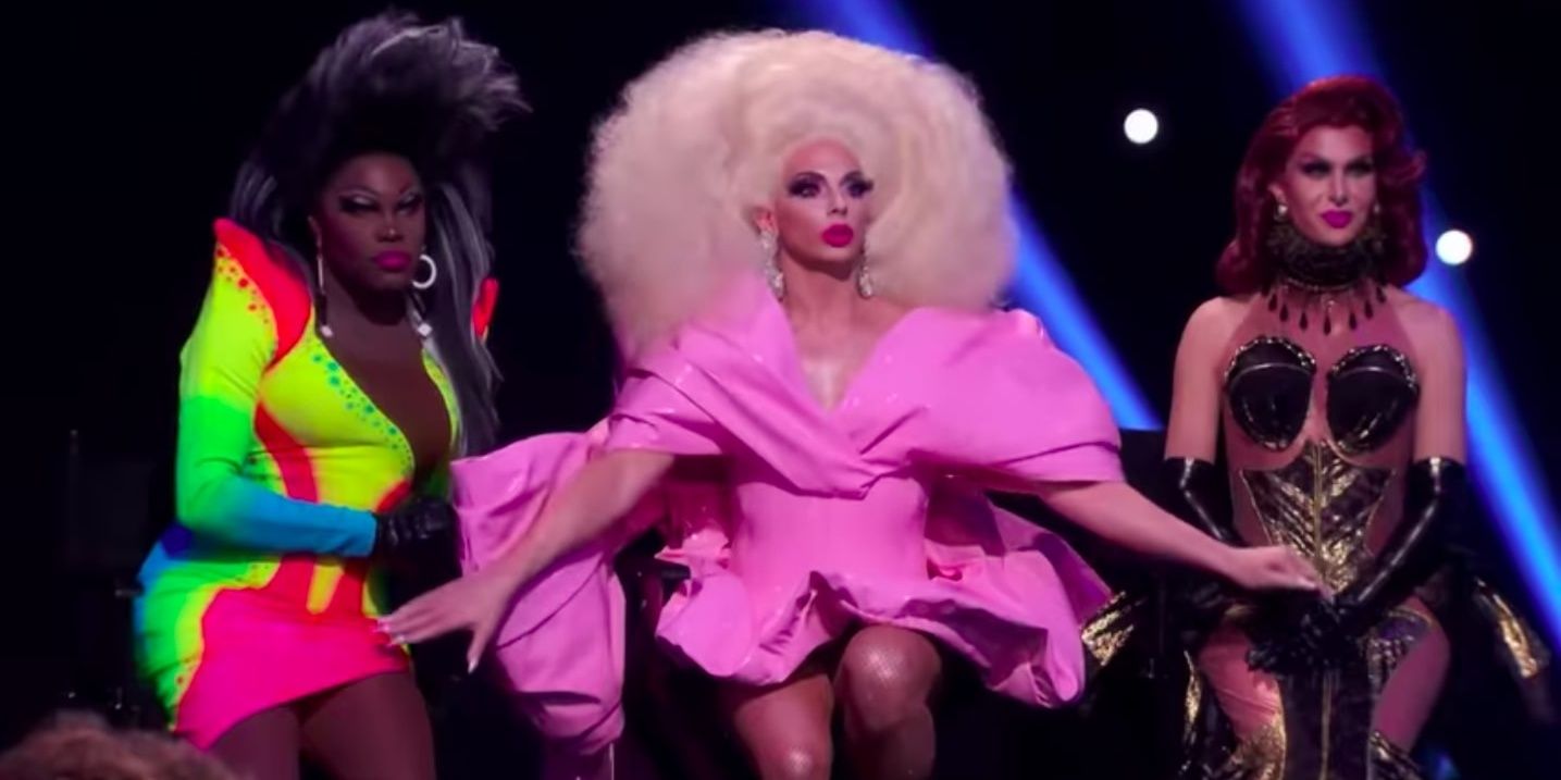Asia O'Hara, Alyssa Edwards, and Trinity the Tuck standing together in RuPaul's Drag Race.