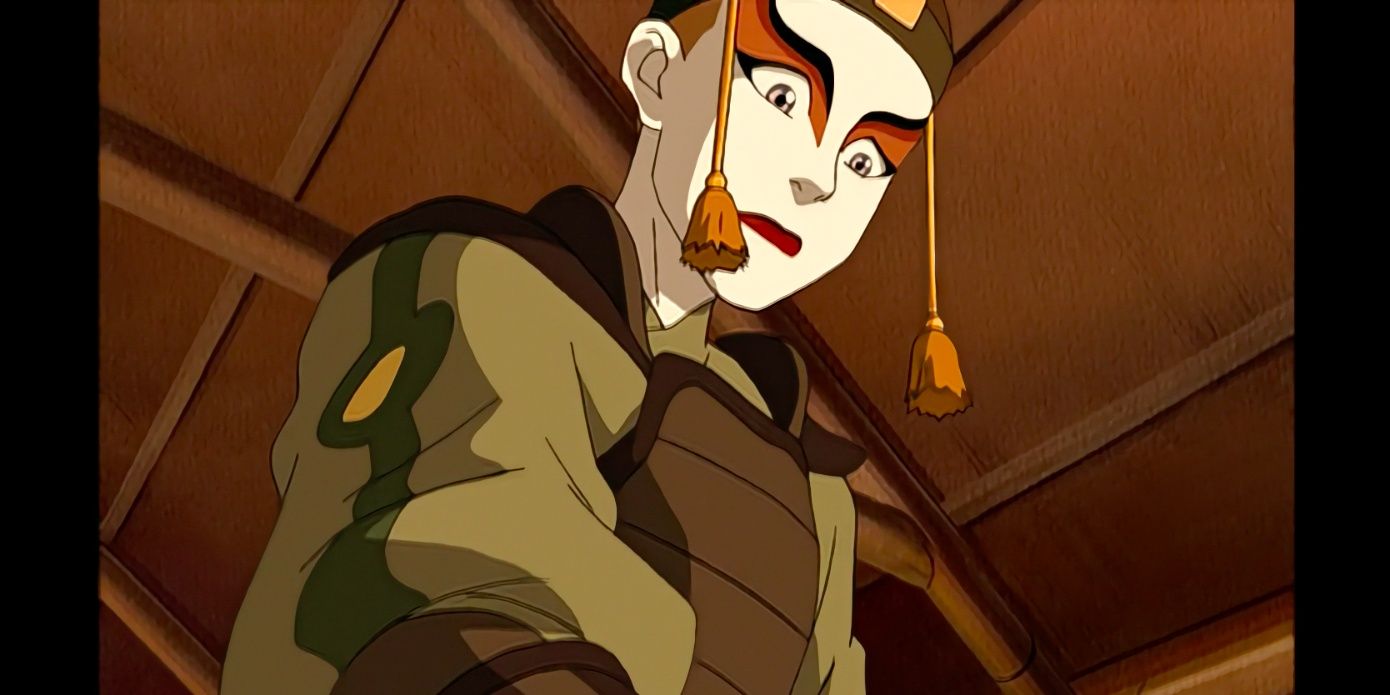 Kyoshi olhando para baixo com os olhos arregalados em choque em Avatar The Last Airbender.