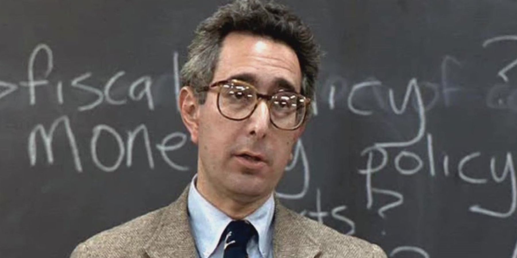 Teacher in front of a chalkboard in Ferris Bueller's Day Off