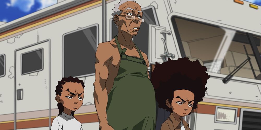 The lead characters of The Boondocks standing in front on an RV