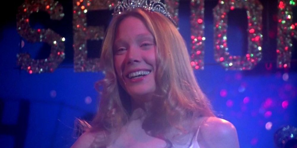 Carrie smiling after being crowned Prom Queen in Carrie