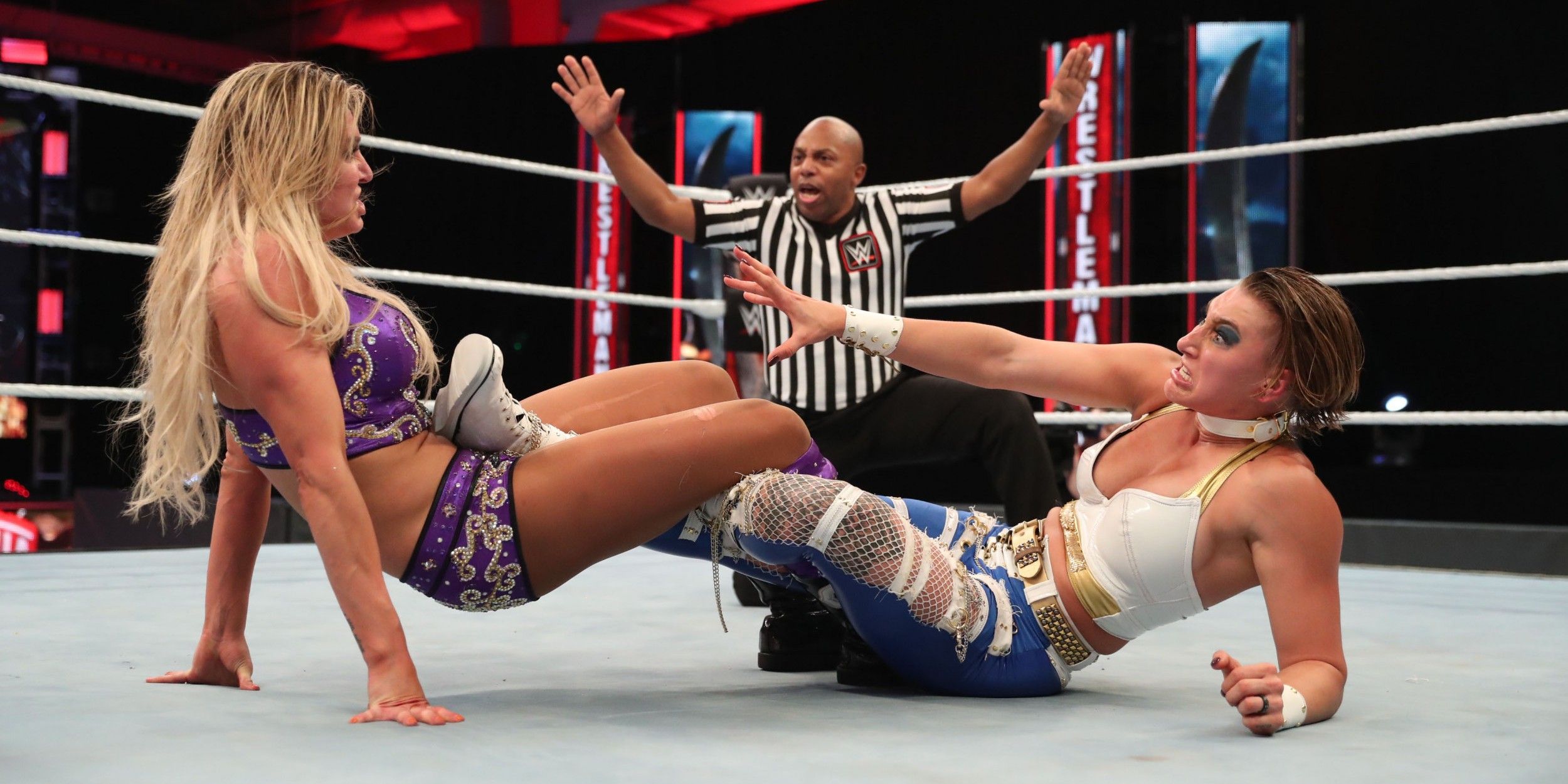 Charlotte Flair and Rhea Ripley at WWE Wrestlemania 36