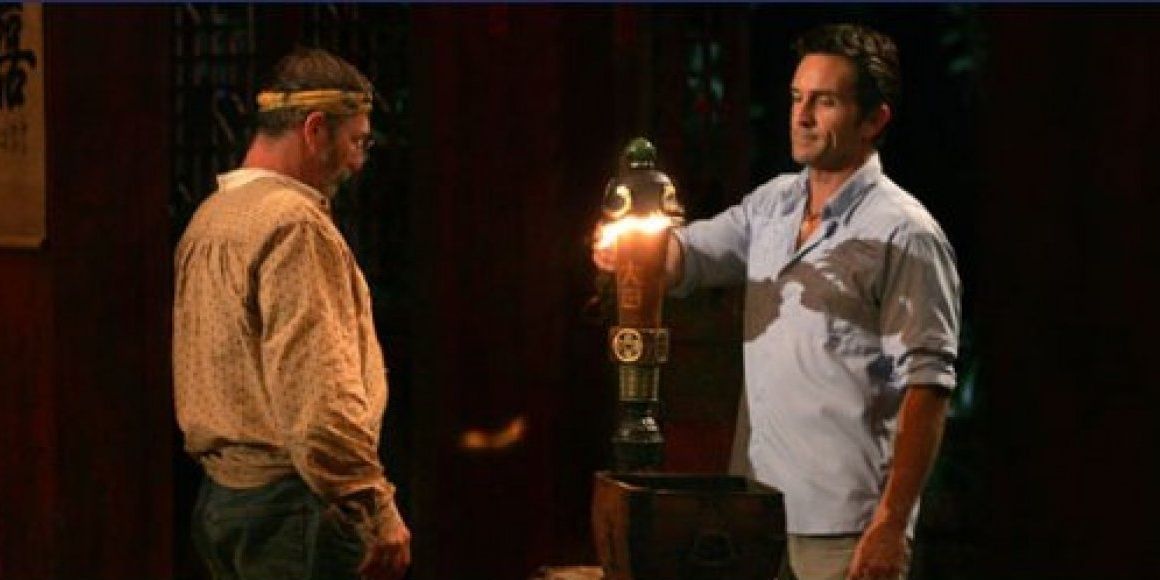 Jeff Probst snuffs Chicken George's torch on Survivor