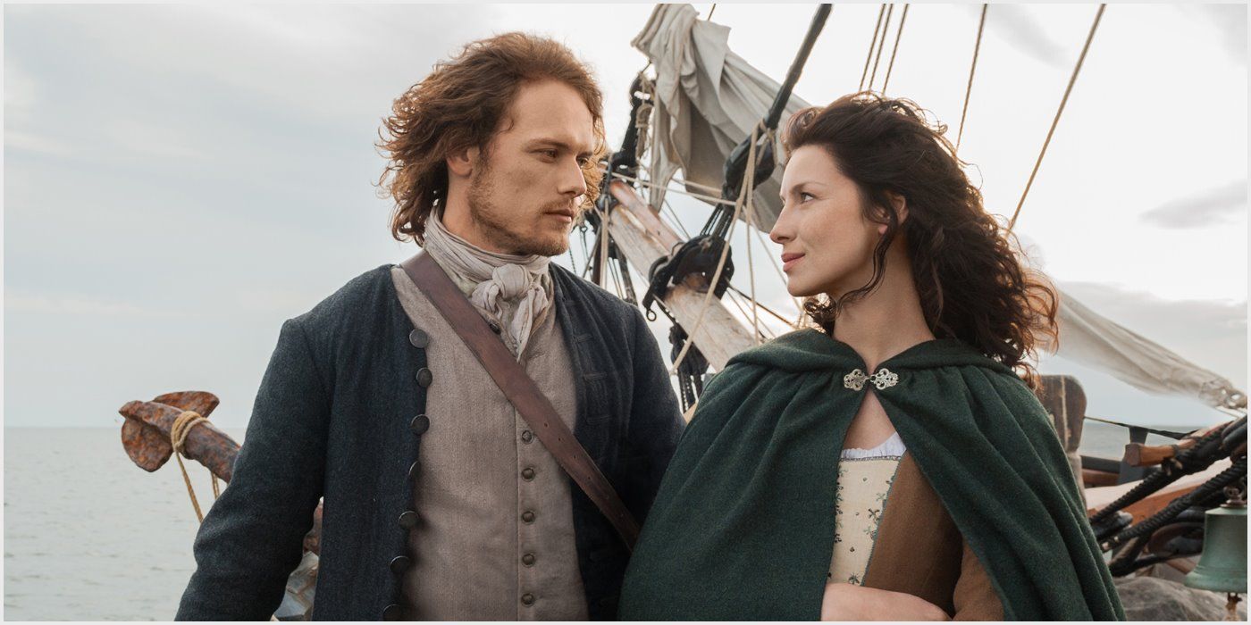 Claire and Jamie looking at each other intensely in Outlander.