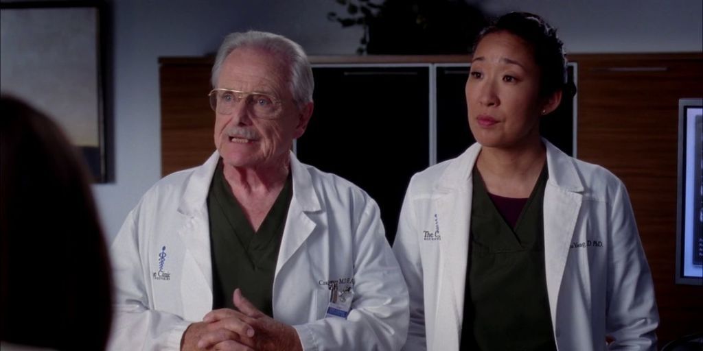 Cristina standing beside Thomas in Grey's Anatomy