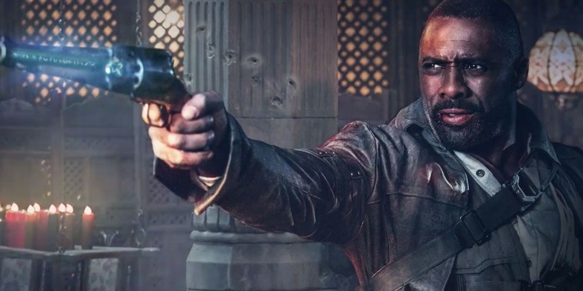 Idris Elba points a gun in The Dark Tower