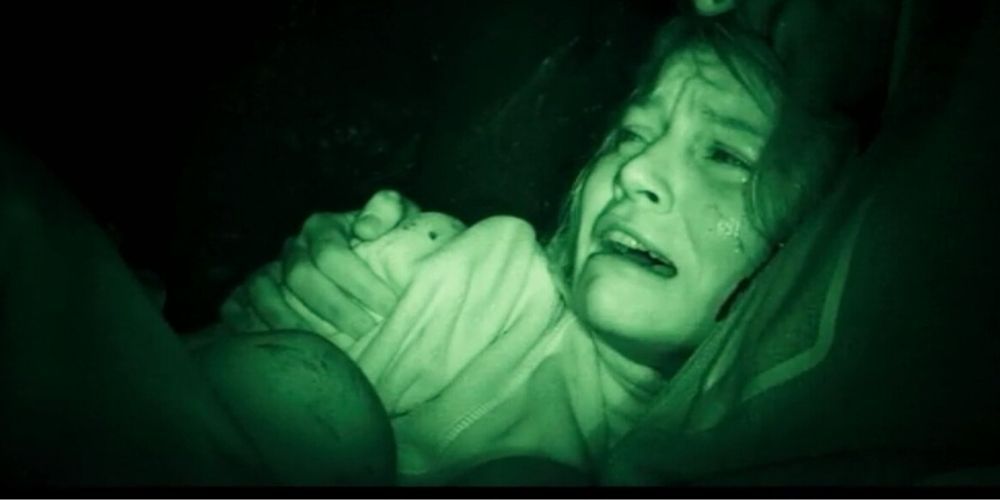 A woman films herself in night vision from Devil's Pass