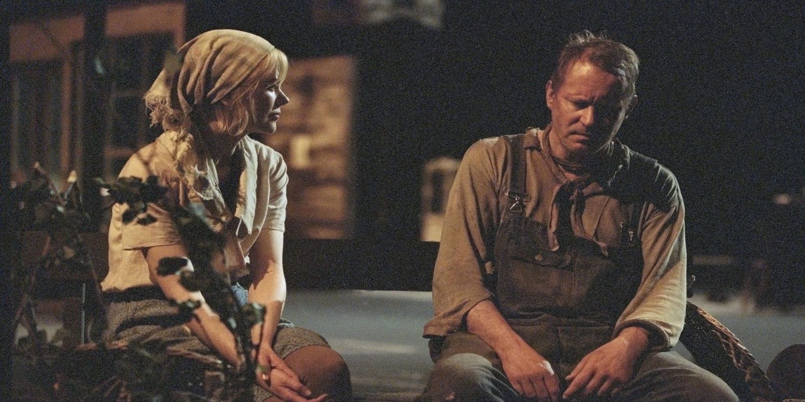 Grace and Chuck speak on the street in Dogville