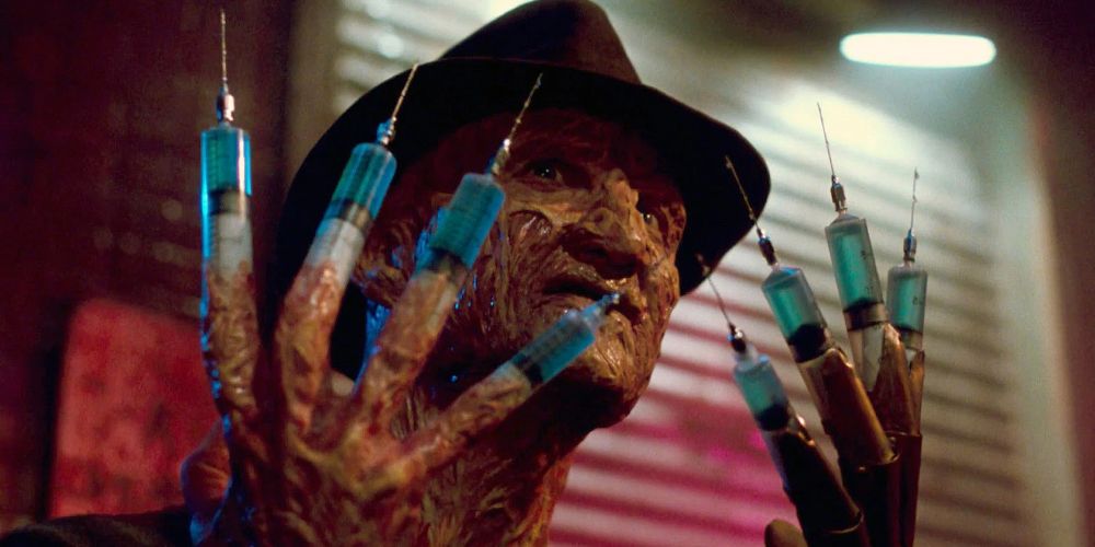 Freddy Krueger holding up his hands in A Nightmare On Elm Street: Dream Warriors