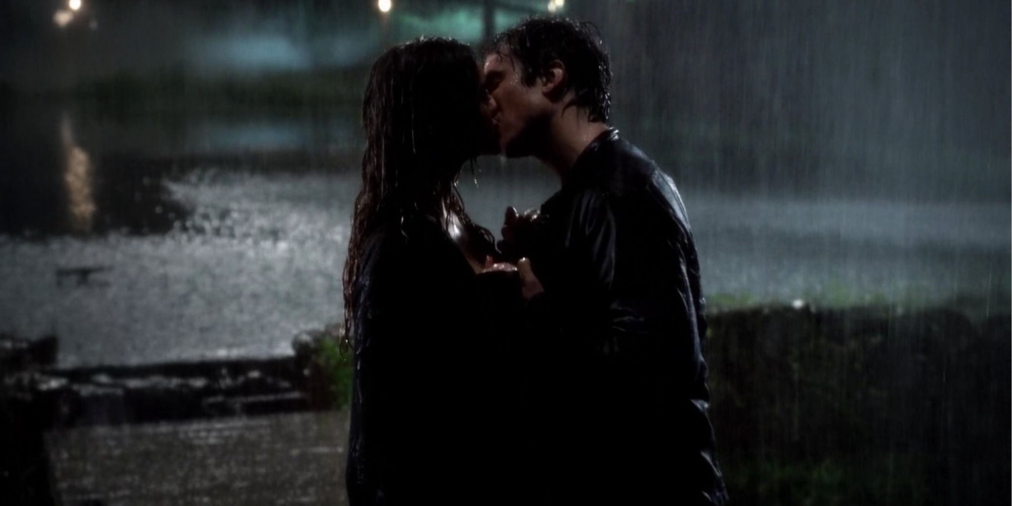 Elena kisses Damon in the rain on The Vampire Diaries