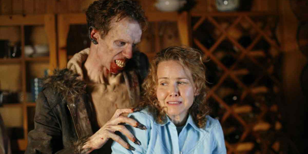 A zombie holding a worried woman's shoulder in Fear Itself 