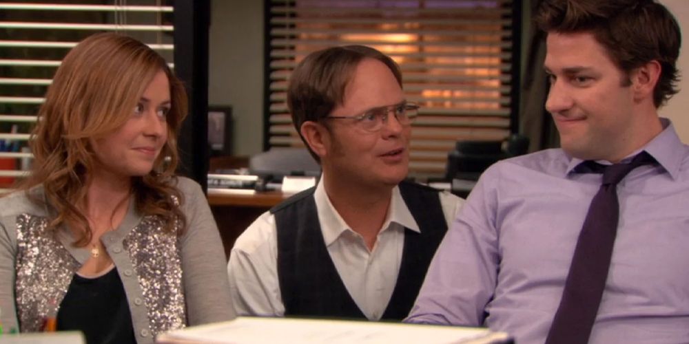Dwight Jim and Pam are sat together in The Office US