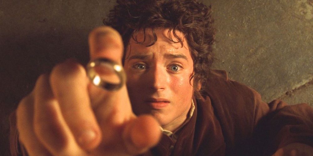 Frodo reaching out for the ring in Lord of the Rings