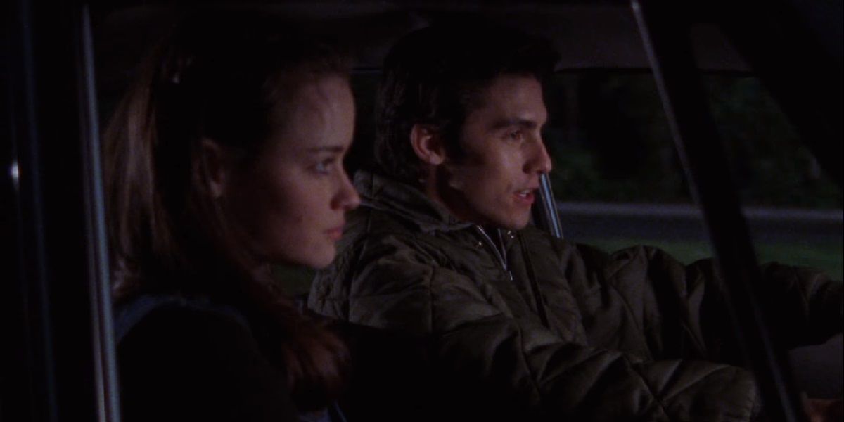 Rory and Jess sitting in a car together on Gilmore Girls