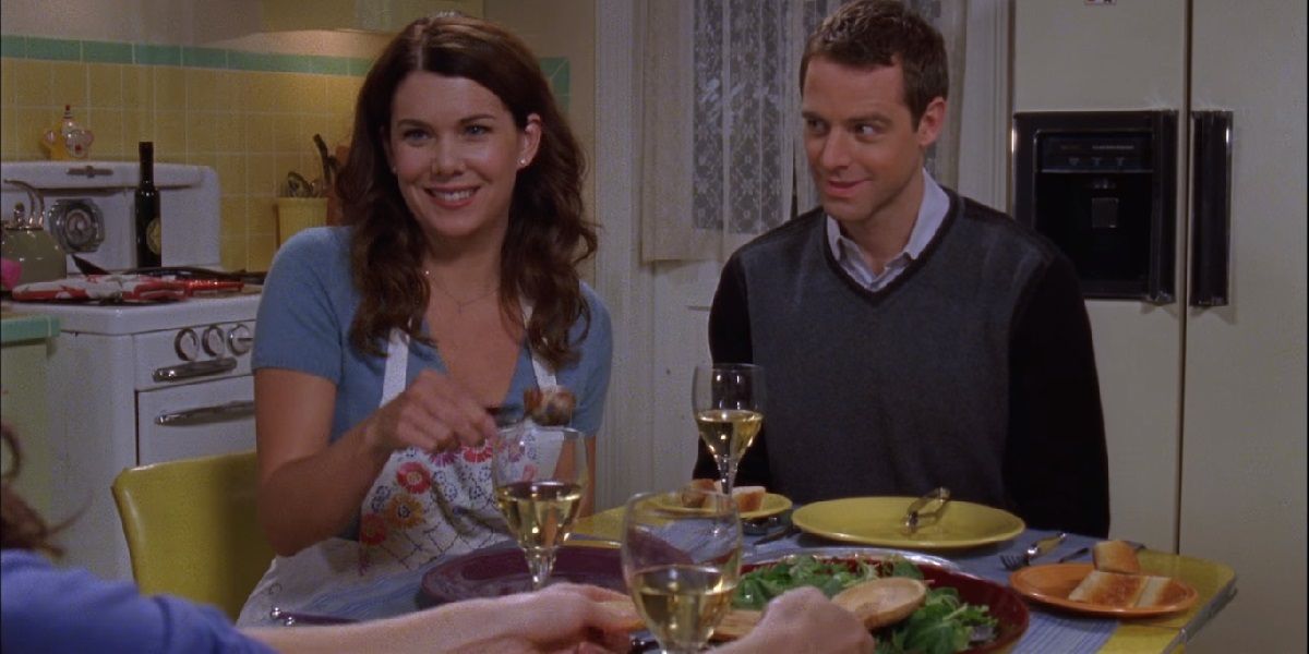 Lorelai and Christopher sitting at the kitchen table on Gilmore Girls