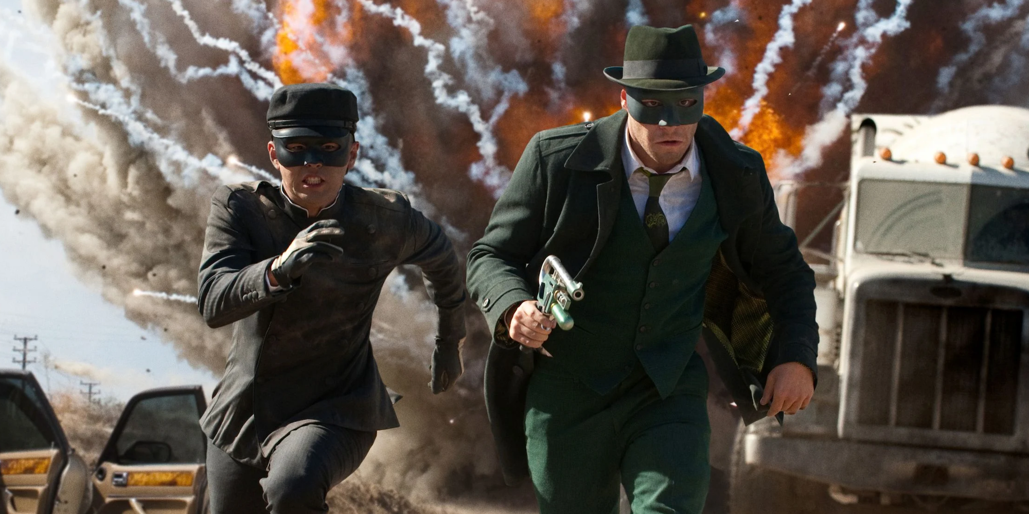 Britt and Kato run from an explosion in The Green Hornet