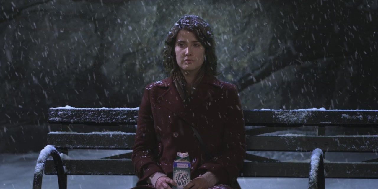 Robin sits on a snowy bench in central park after finding out she is infertile and cannot have kids