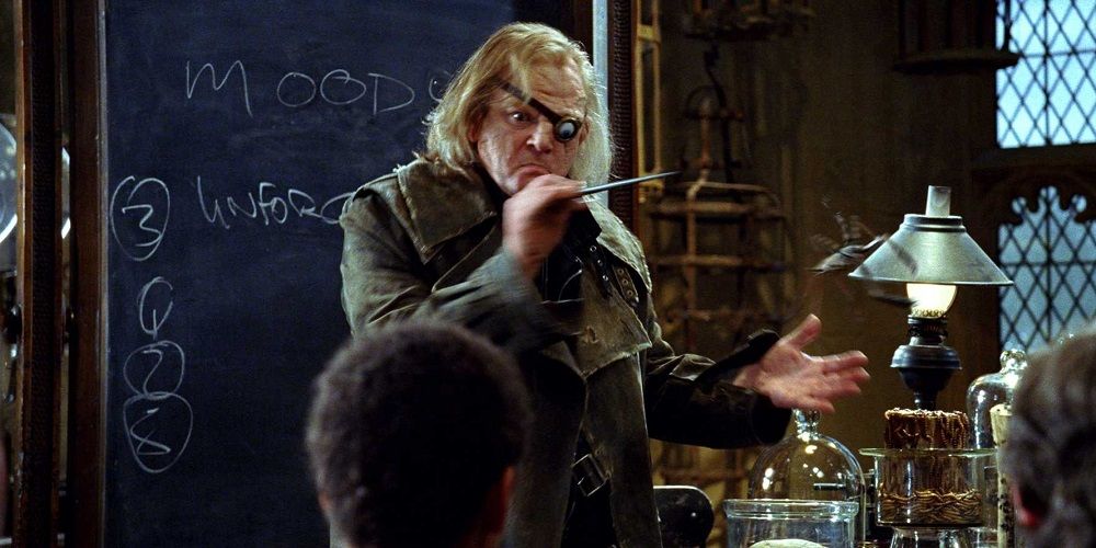 Madeye Moody from Harry Potter teaches the class Unforgivable Curses using a spider 