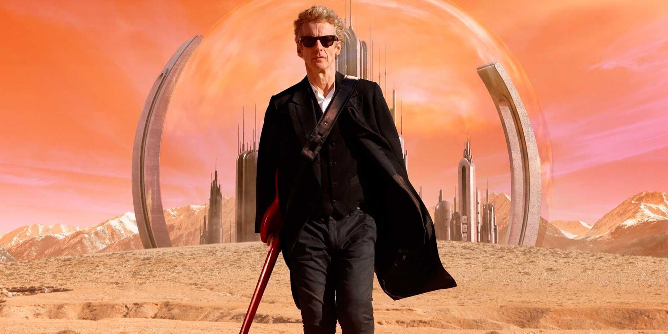 The Twelfth Doctor holding his guitar as he walks away from Gallifrey
