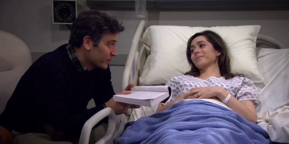 Ted sitting with his wife in the hospital in How I Met Your Mother.