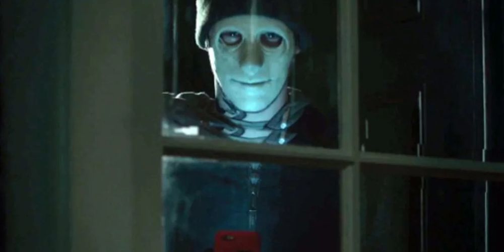 Masked Man in the window from Hush